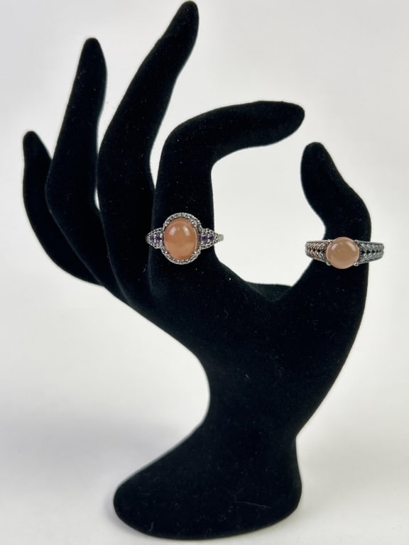 (2) Sterling & Peach Moontstone Rings: (2) sterling silver and peach moonstone rings, sizes 7 & 9. Total weight inclusive of all materials: 8.890 grams.