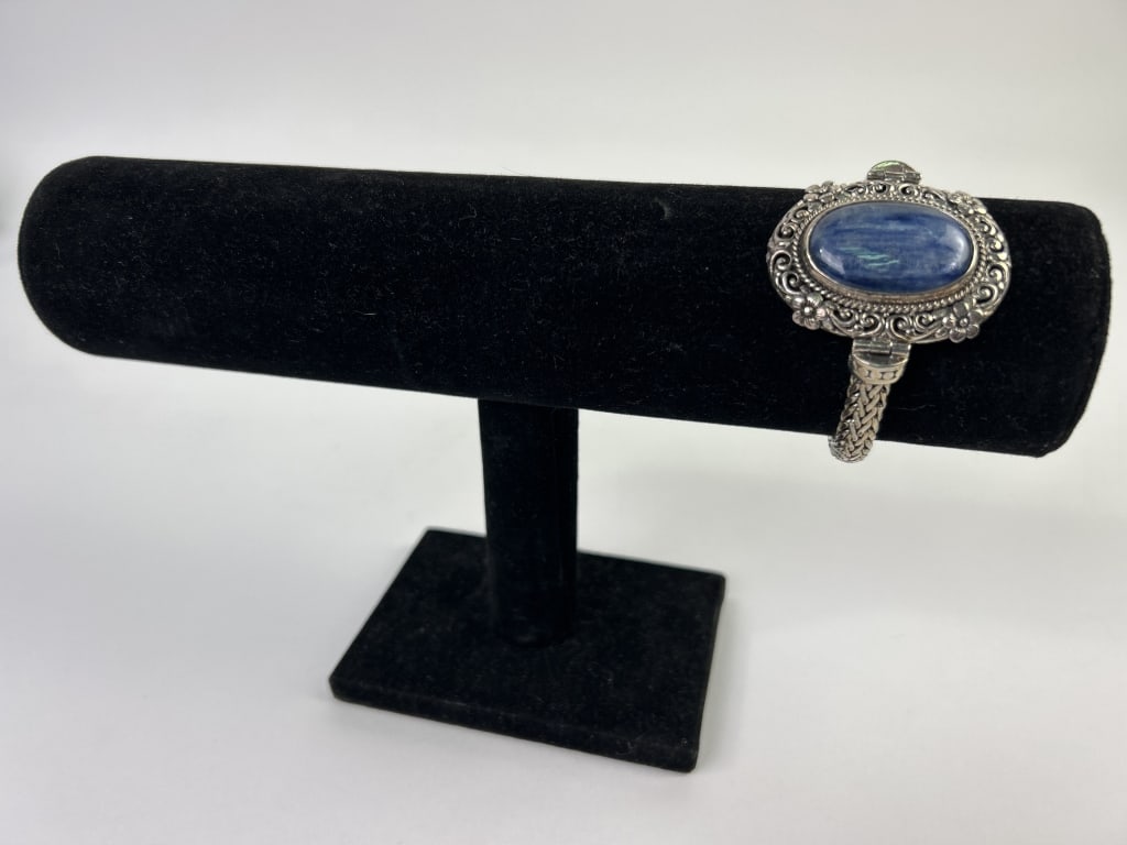 Sterling & Kyanite Bracelet: Sterling & Kyanite Bracelet. Total weight inclusive of all materials: 56.0 grams. 7-5/8 inches long x 1-3/4 inches.