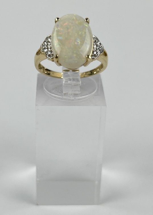 14k Gold, Opal & Diamond Chip Ring: 14k Gold, Opal & Diamond Chip Ring. Total weight inclusive of all materials 3.276 grams. Size 7.