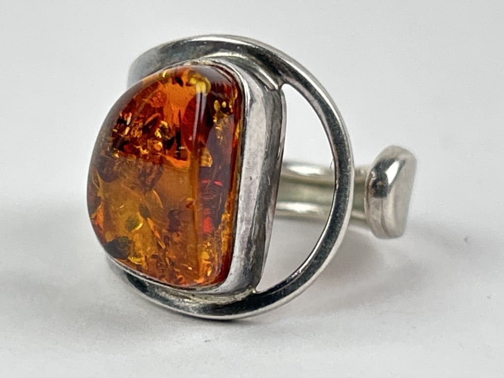 Sterling & Natural Amber Ring: Sterling and natural amber ring. Total weight inclusive of all materials: 6.94 grams. Size 7.