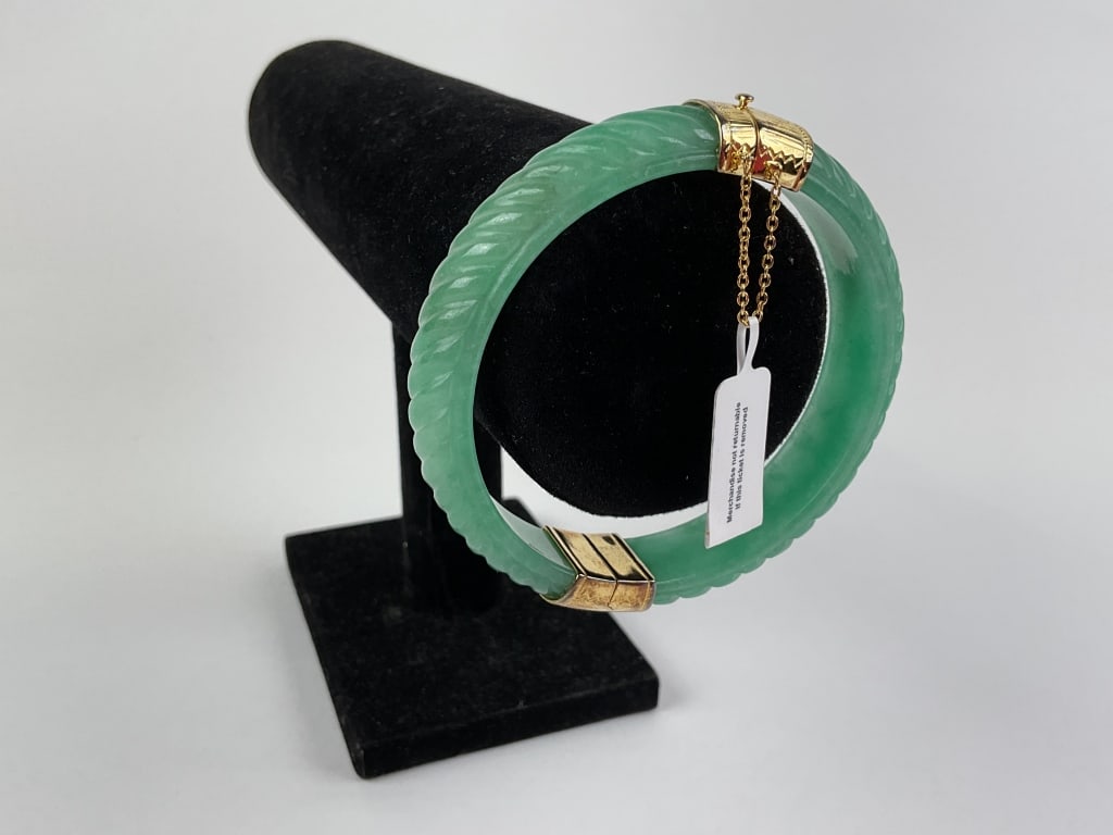 Jade Bangle Bracelet Sterling Closure: Jade bangle bracelet with 14k over sterling closure. Total weight 60 grams.