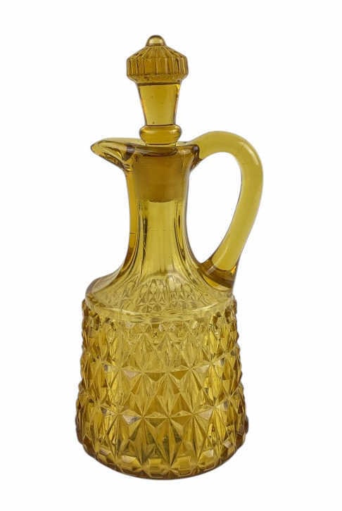 Cental Glass Co. Amber Glass Pressed Diamond Cruet Circa 1885: Measures approximately 7.5 inches including stopper.