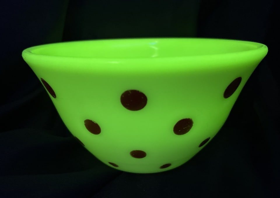 McKee Uranium Yellow Glass Red Polka Dot Mixing Bowl: McKee Uranium yellow glass red polka dot mixing bowl. Smooth Finish and a slightly curved rim, with a translucent quality,