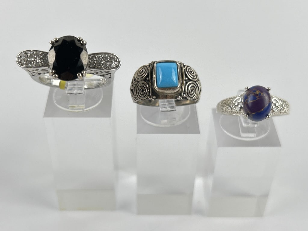 (3) 925 Sterling Silver Rings with Gemstone Accents weighing 3.942 grams, 6.161 grams, and 3.034 (1 of 5)