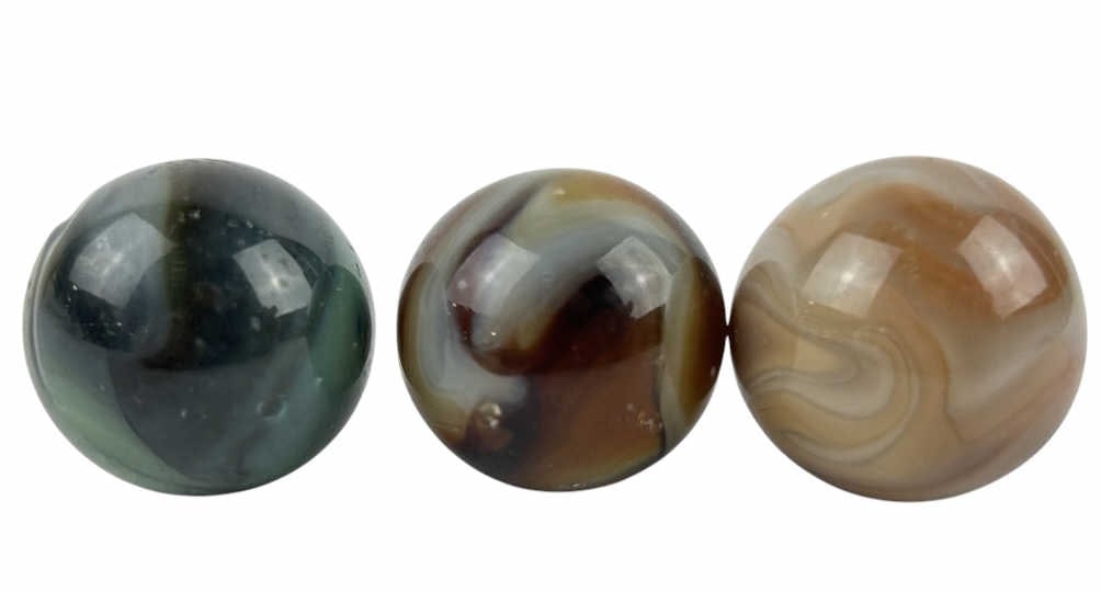 (3) Glass Glowing Shooter Marbles: (3) Glass glowing shooter marbles each featuring unique swirls in colors such as brown, red, blue, and green. Each marble has swirls that light up under blacklight. Each marble is about 1 inch around.