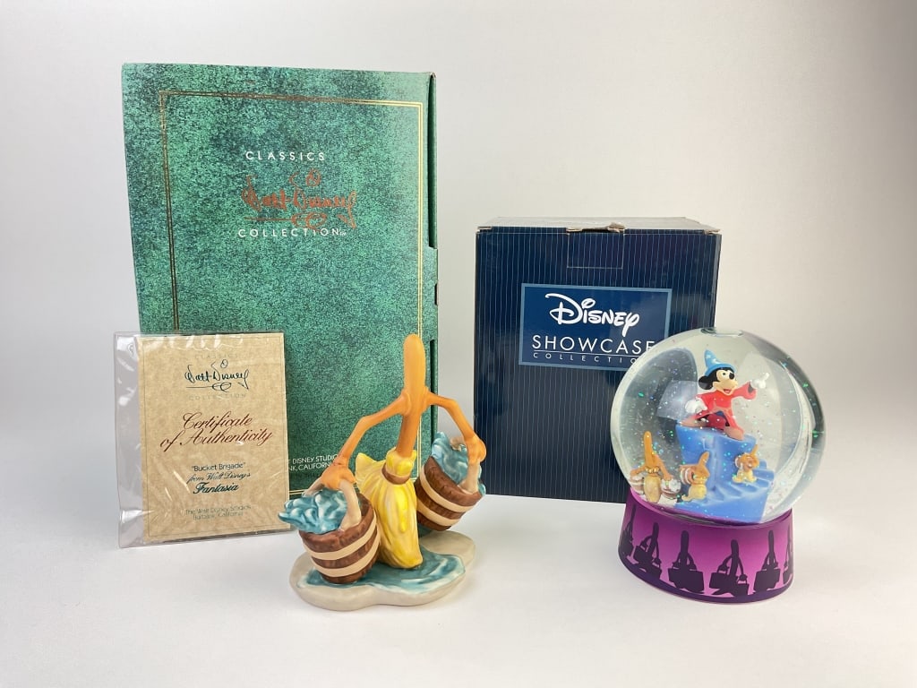 "Bucket Brigade!" Figurine and Sorcerer Mickey and Brooms Snowglobe: Walt Disney Classics Collection figurine of Broom from Fantasia. Titled "Bucket Brigade!" Orginal box and Certificate of Authenticity included. Disney Showcase Collection Snowglobe by Enesco of Sorcer