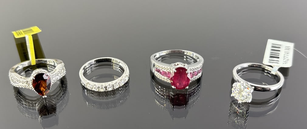 (4) 925 Sterling Silver Rings, one made in India, featuring Clear, Orange, and Red Gemstones. Total (1 of 1)