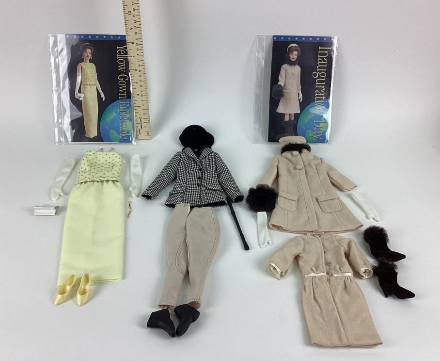 Franklin Mint Jackie Doll Clothes: Franklin Mint Jackie Doll Clothes Sets including Yellow Gown Ensemble with COA, Inauguration Day, January 20, 1961 Sable-Trimmed Coat Ensemble, and a set with a jacket, hat, shoes, and more.