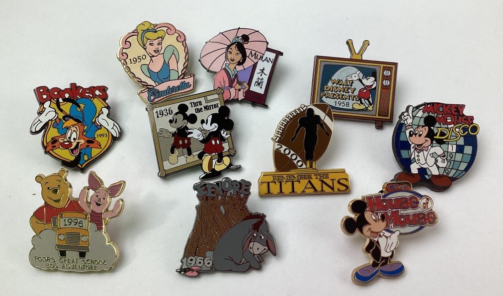 (10) Disney Collector Trader Pins: (10) Disney Collector Trader Pins, including Mickey Mouse, Bonkers, Eeyore, Cinderella, Mulan, Winnie the Pooh, Remember the Titans