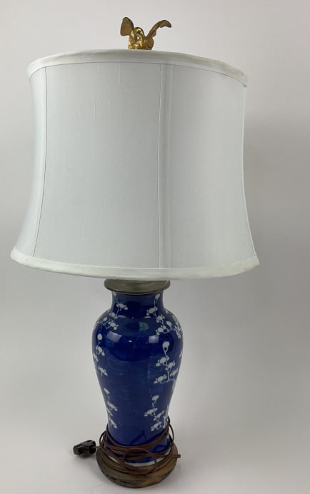 Antique Chinese Blue and White Porcelain Prunus Jar, Mounted as a Table Lamp, with Antique Gilt Cast: Antique Chinese Blue and White Porcelain Prunus Jar, Mounted as a table lamp, with antique gilt cast iron crane finial. Approx. 26" tall including shade