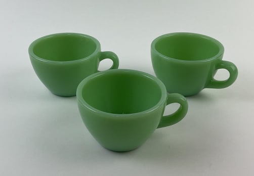 (3) Fire King Oven Glass Jadeite Tea Cups: (3) Fire King Oven Glass Heavy Jadeite Tea Cups Restaurant Ware. Measures approx. 2.5" tall and has a diameter of approx. 3.5".