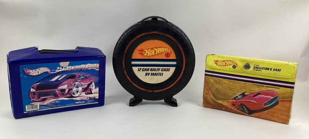 (3) Hot Wheels Carrying Cases: (3) Hot Wheels Carrying Cases including Hot Wheels 1968 12 Car Collector's Case with 12 adjustable compartments, 1967 Hot Wheels 12 Car Rally Case, and 2001 Hot Wheels 24 Car Carry Case.