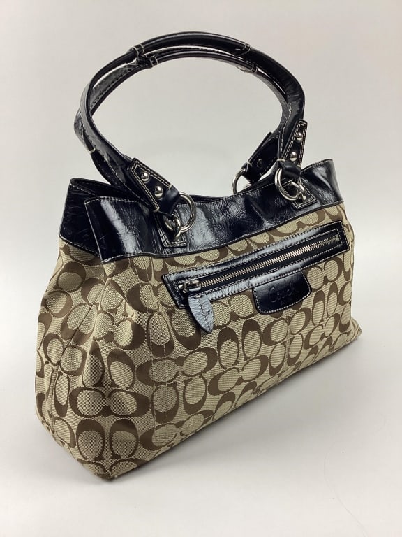 Coach Penelope Signature Tote: Coach Penelope Signature Tote featuring the colors brown and black
