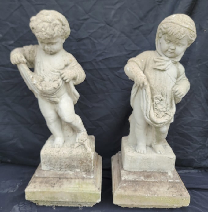 Pair of Victorian Era Cast Stone (Concrete) Garden Statues: Pair of Victorian Era Cast Stone (concrete) garden statues with pedestal bases. 19th Century. Height of Taller: 31 Inches