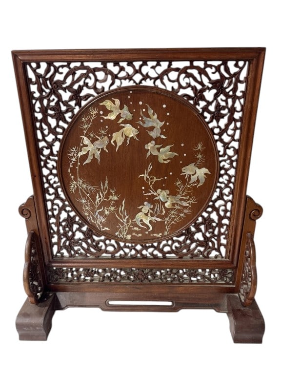 Antique Chinese Carved Rosewood Table Screen: Antique Chinese Rosewood Table Screen with inlaid mother-of-pearl goldfish scene on one side, and brass inlaid bamboo scene on the other side approx. 16.5" across and 18.5" tall.