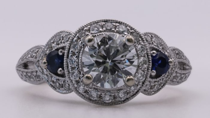 14K White Gold, Diamond, and Sapphire Ring: 14K White Gold, Diamond, and Sapphire Ring TW inclusive of all material: 2.98 pennyweights. Size 6