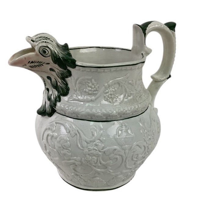 19th Century English Staffordshire Soft Paste Ceramic Grotesque Spout Jug: 19th Century English Staffordshire soft past ceramic grotesque spot jug. Approx. 7" tall and approx. 8" from one side to the other