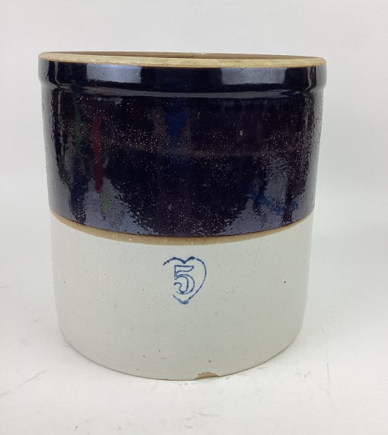 Cream and Dark Brown Colored Stoneware Crock: Cream and Dark Brown stoneware crock marked #5. Measures approx. 12" tall and has a diameter of approx. 12".