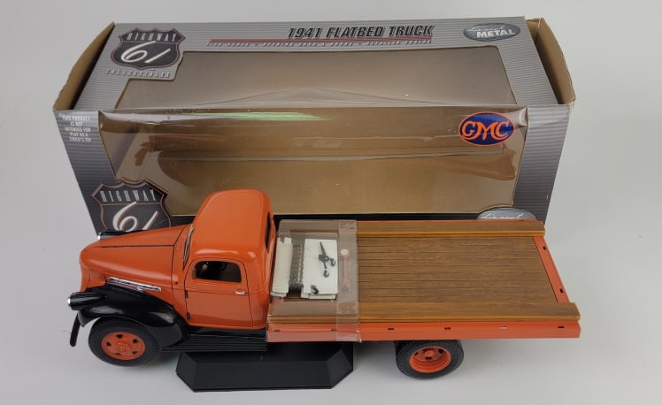 Highway 61 Diecast 1:16 Scale 1941 Flatbed Truck: 2002 Highway 61 GMC Diecast 1:16 Scale 1941 Flatbed Truck. Features opening hood and doors. In original packaging.