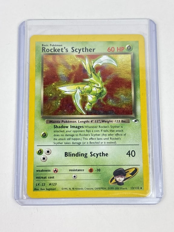 Rocket's Scyther Gym Hereos Holo Pokemon Card: Rocket's Scyther Gym Hereos Holo Pokemon Card- unplayed. In a sleeve