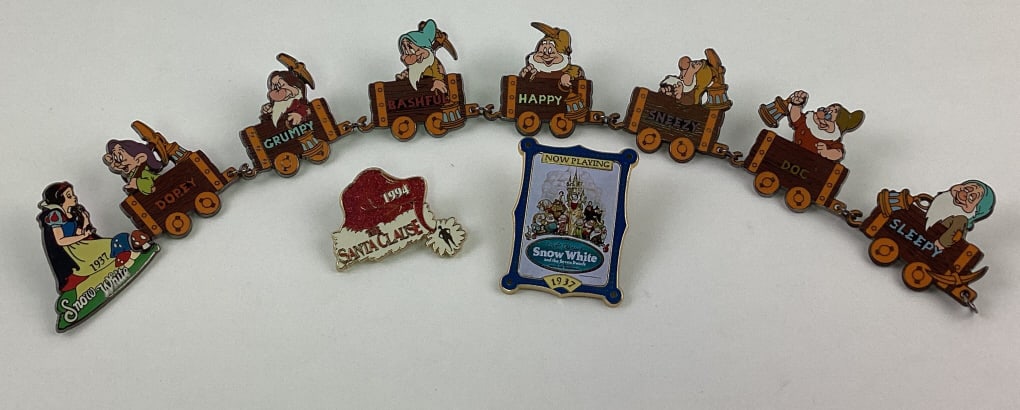 (10) Disney Collector Trader Pins: (10) Disney Collector Trader Pins, including Snow White and some of the Dwarf's, Santa Clause