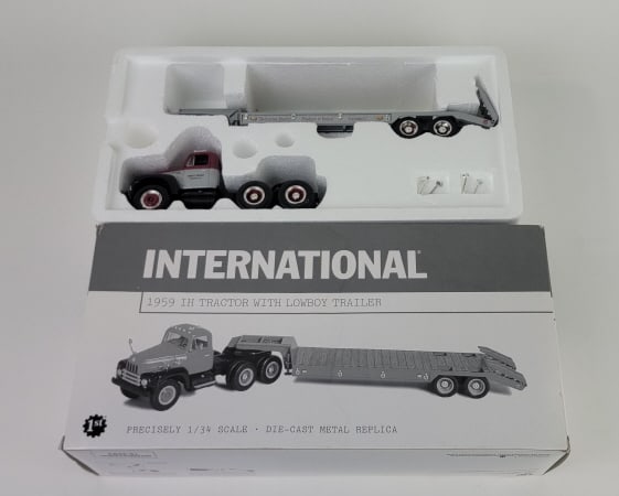 First Gear 1/34 Scale Diecast IH Tractor with Lowboy Trailer: 2000 First Gear International Trucks 1/34 Scale Diecast 1959 IH Tractor With Lowboy Trailer in original packaging