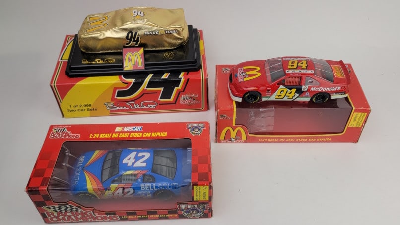 Bell South #42 Joe Nemecheck, McDonald's Monopoly Bill Elliott, and 24K Gold Bill Elliott Diecast: (3) Diecast Models including Racing Champions 50th Anniversary NASCAR 1:24 Scale Bell South #42 Joe Nemechek, 1996 Racing Champions NASCAR 1/24 Scale McDonald's Monopoly #94 Bill Elliott Diecast Car, 