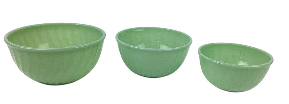(3) Fire King Jadeite Restaurant Ware Swirl Mixing Bowls: (3) Fire King Jadeite Restaurant Ware Swirl Mixing Bowls. One is approx. 3" tall and 6" diameter. The second bowl is approx. 3.5" tall and 7" diameter. The last bowl is approx. 4" tall and 8" diameter