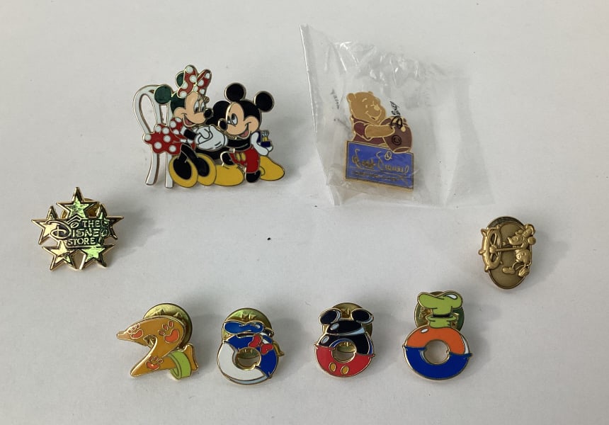 (8) Disney Collector Trader Pins: (8) Disney Pins including Mickey and Minnie Mouse, Winnie the Pooh, The Disney Store and others