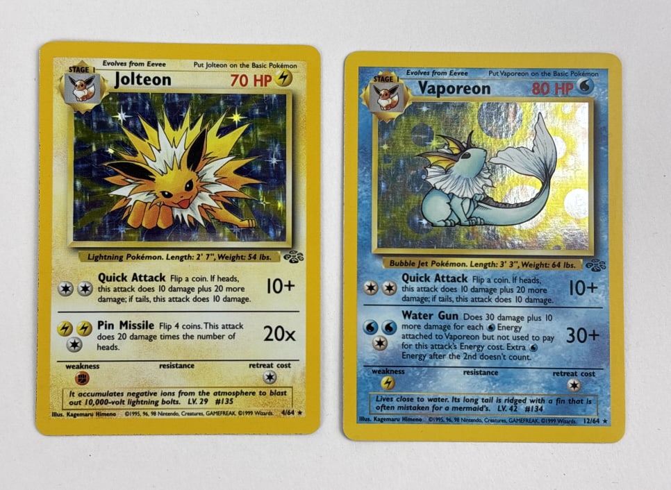 Jolteon Black Star and Vaporeaon Halo Pokemon Cards: Jolteon 4/64 Black Star Jungle set Card in excellent condition, and Vaporeon Halo Jungle Set Pokemon Card