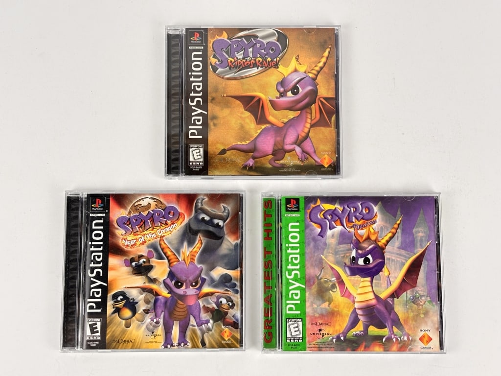 (3) PlayStation Spryo Games: (3) PlayStation Spyro Games, Spyro - Year of the Dragon, Spyro - Ripto's Rage! And Spyro - The Dragon, includes compact discs, instruction booklets and original cases
