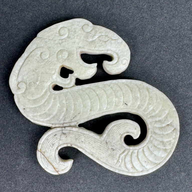 Archaic Chinese Carved S-Form Dragon Pendant: Archaic Chinese Carved S-Form Dragon Pendant. 3 inches x 2-1/2 inches. 51.33 grams.