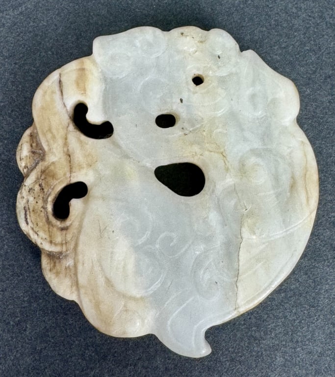 Chinese Finely Carved Nephrite Jade Pendant Mythical Beast: Chinese Finely Carved Nephrite Jade Pendant Mythical Beast. 2-1/8 inches diameter. 48.87 grams.