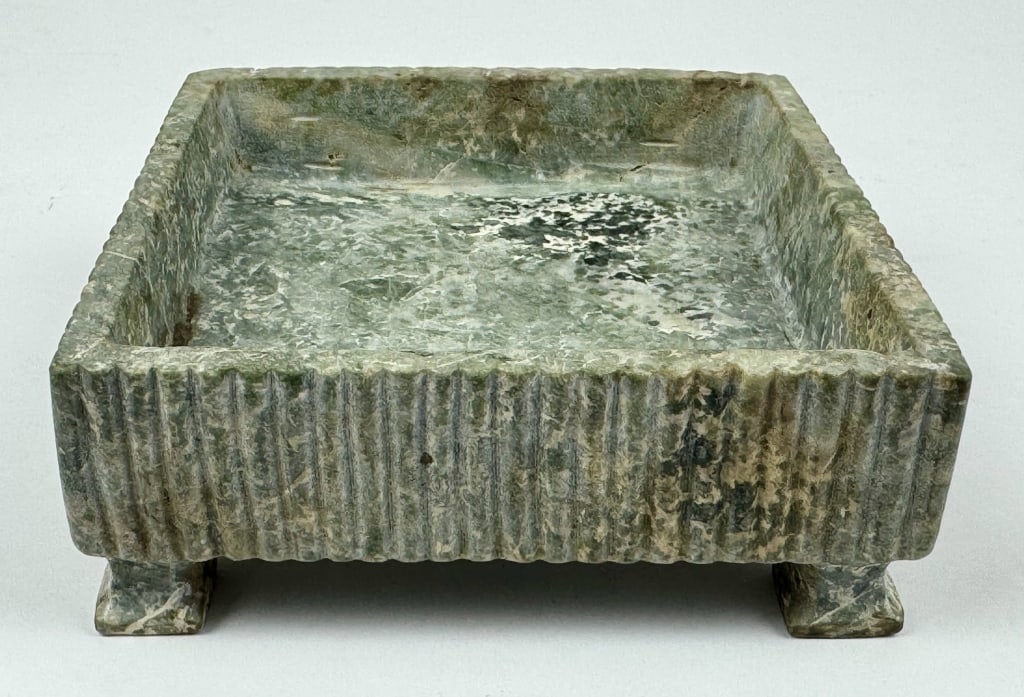 Archaic Chinese Carved Jade Footed Vessel: Archaic Chinese Carved Jade Footed Vessel, having an 8-character incised seal on the underside. 1-3/4 inches tall x 4-7/8 inches x 4-3/4 inches. 752 grams.