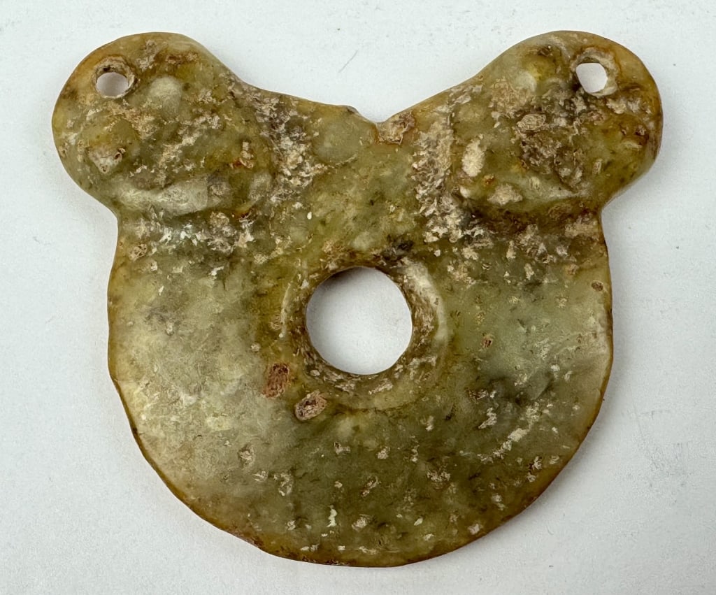 Archaic Chinese Carved Jade Pendant: Archaic Chinese Carved Jade Pendant. 2-1/2 inches x 2-1/4 inches. 35 grams.