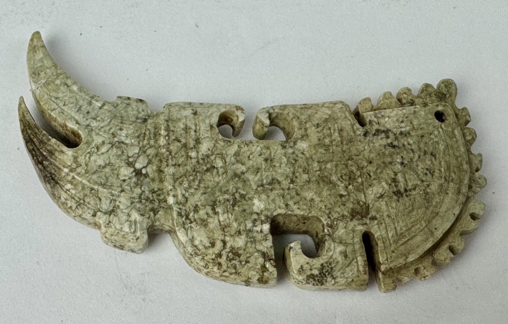 Archaic Chinese Carved Celadon Jade Pendant Huang Form: Archaic Chinese Carved Celadon Jade Pendant Huang Form. 2-7/8 inches x 1-1/4 inches. 32.24 grams.