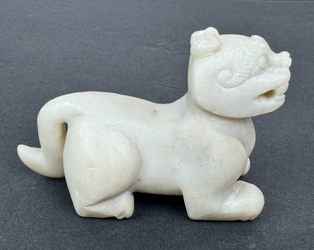 Chinese Carved Soapstone Foo Lion Figure: Chinese Carved Soapstone Foo Lion Figure. 2-1/2 inches tall x 4 inches long x 1-1/2 inches wide.