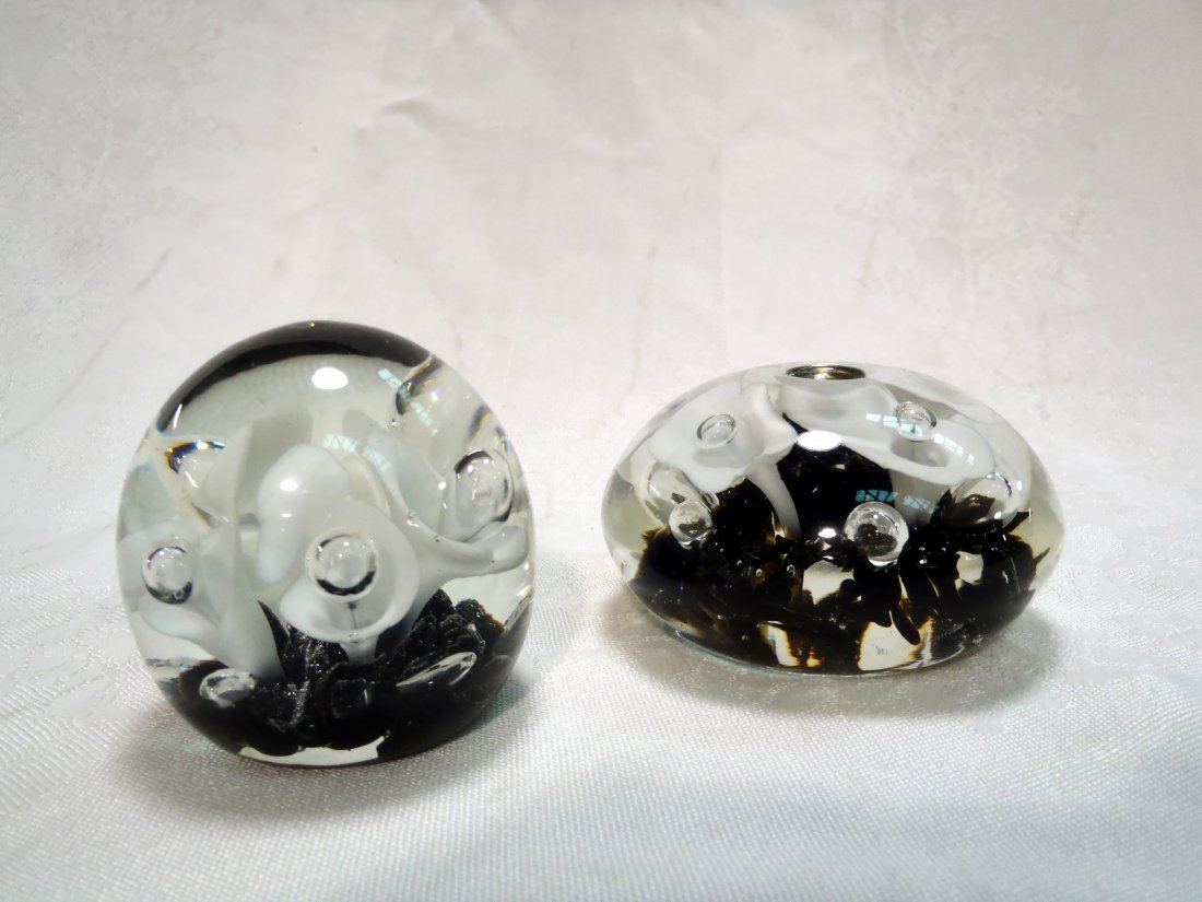 Two St. Clair art glass paperweights: Two St. Clair art glass paperweights Disc-shaped one is stamped Hand Made By St. Clair. Spherical one is stamped Joe St. Clair. Shipping rate B.