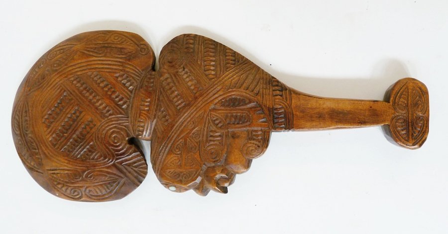 Maori style paddle, carved decoration and carved handle: Maori style paddle, carved decoration and carved handle