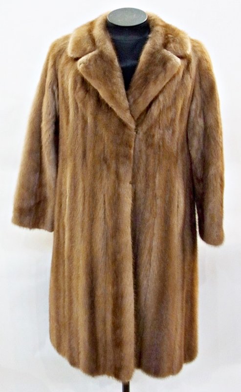 A pale mink full length coat: A pale mink full length coat