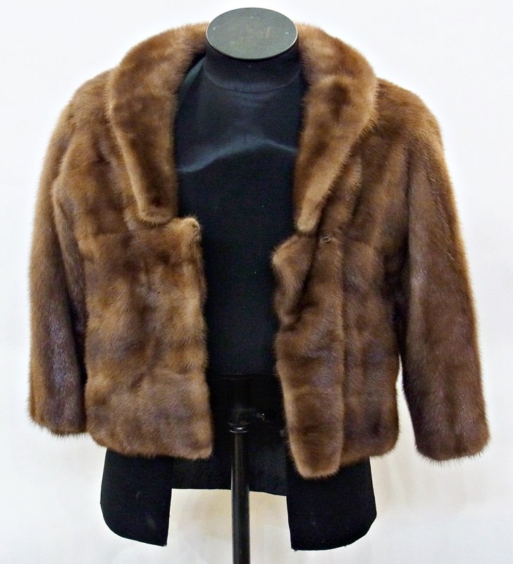 A short mink jacket by "B Manock of Durban": A short mink jacket by "B Manock of Durban"