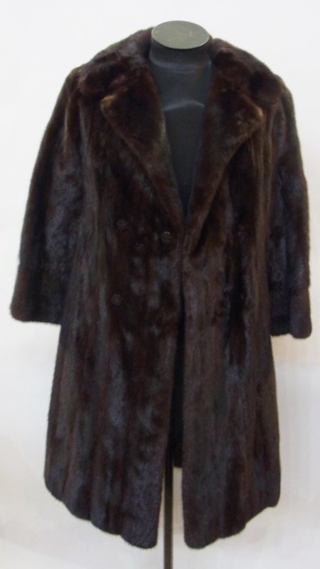A full length black mink coat, half belt on the back: A full length black mink coat, half belt on the back