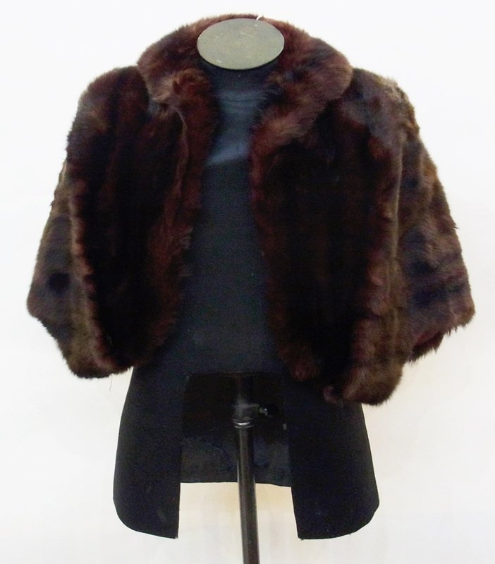 A dark mink short cape with shawl collar: A dark mink short cape with shawl collar
