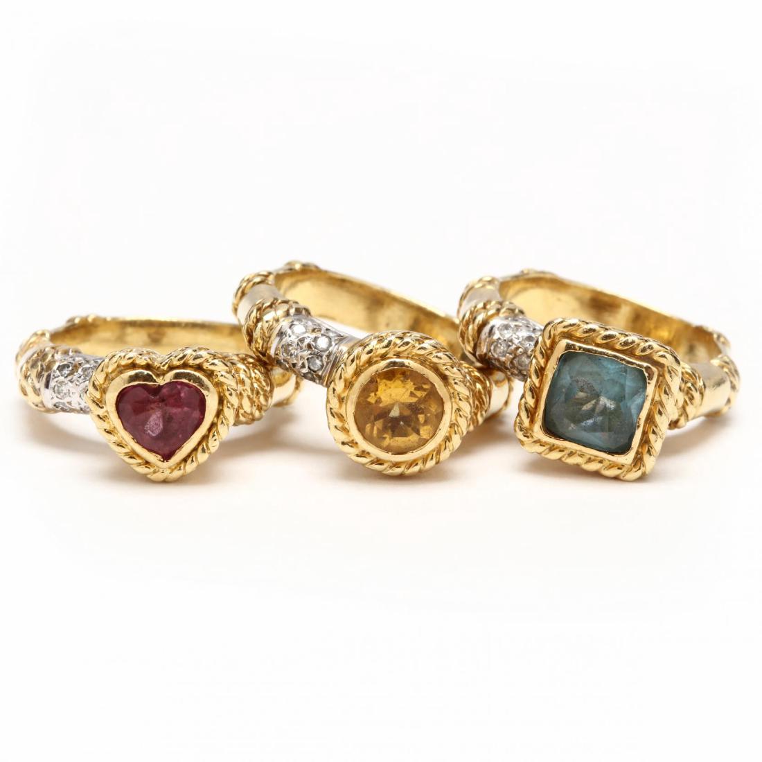Three 18KT Gem Set Stackable Rings, Cassis: the first centered with one heart shape faceted pink tourmaline weighing approximately .85 carat bezel set and with rope twist detail to surround and shank and accented to one side with (10) round cut