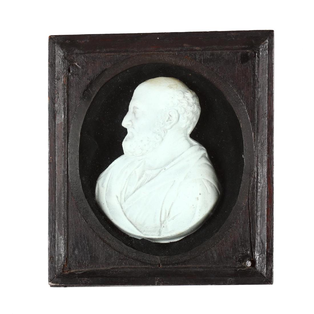 An Antique English Wax Portrait of Hippocrates: circa 1800, the Greek physician depicted in profile against a black fabric in a painted frame with the original glass. DOA 7.5 x 6.75 in. Collection of Denise A. Simon, Indiana and Florida Additional