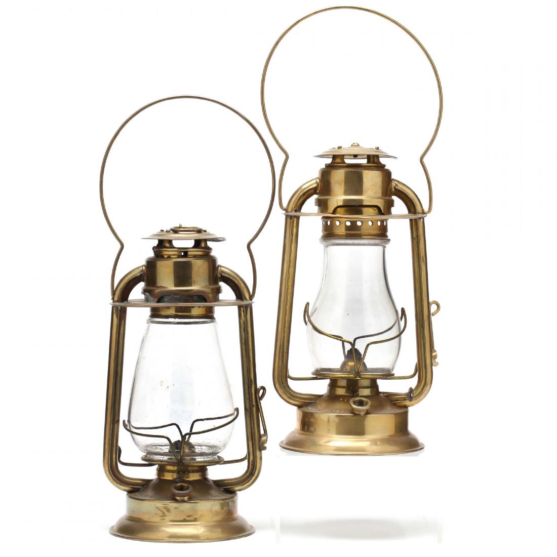 Near Pair of Hams Gem. "Cold Blast" Lanterns: early 20th century. embossed brass body with clear pressed glass globes, marked. Taller 11.25 in. Additional high-resolution photos are available at LelandLittle.com