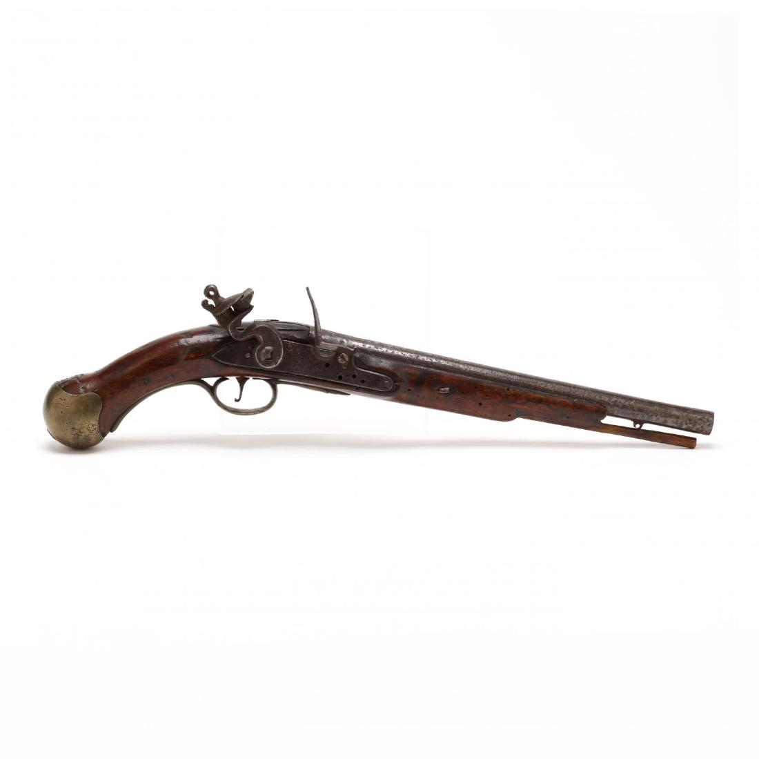 English Sea Service Flintlock Pistol: late 18th century, 12 in, round barrel with proof marks before the breech, walnut stock with brass furniture; the lockplate stamped in center with crown over GR, behind the hammer the plate is stamped