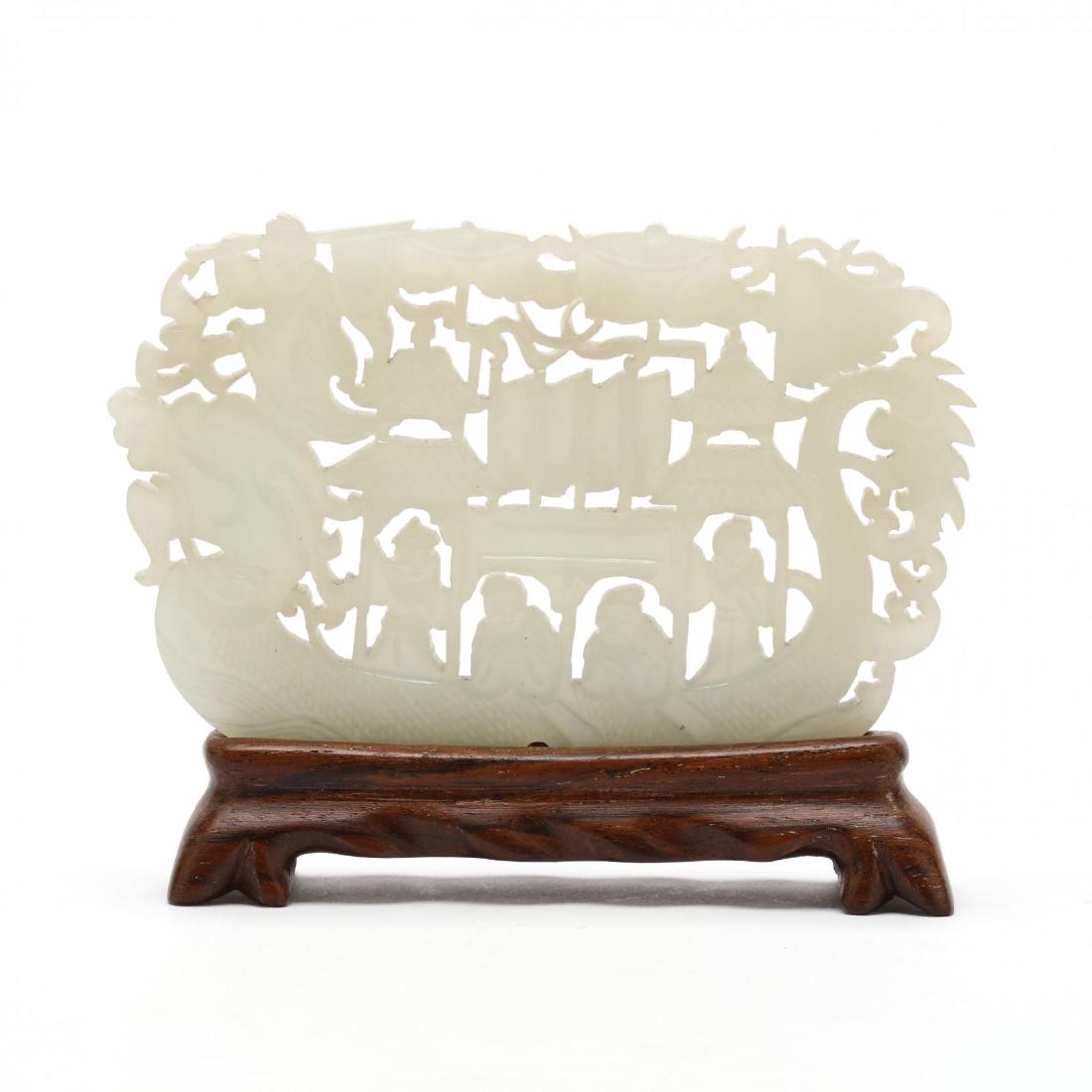 A Carved White Jade Pendant of a Boat (1 of 5)