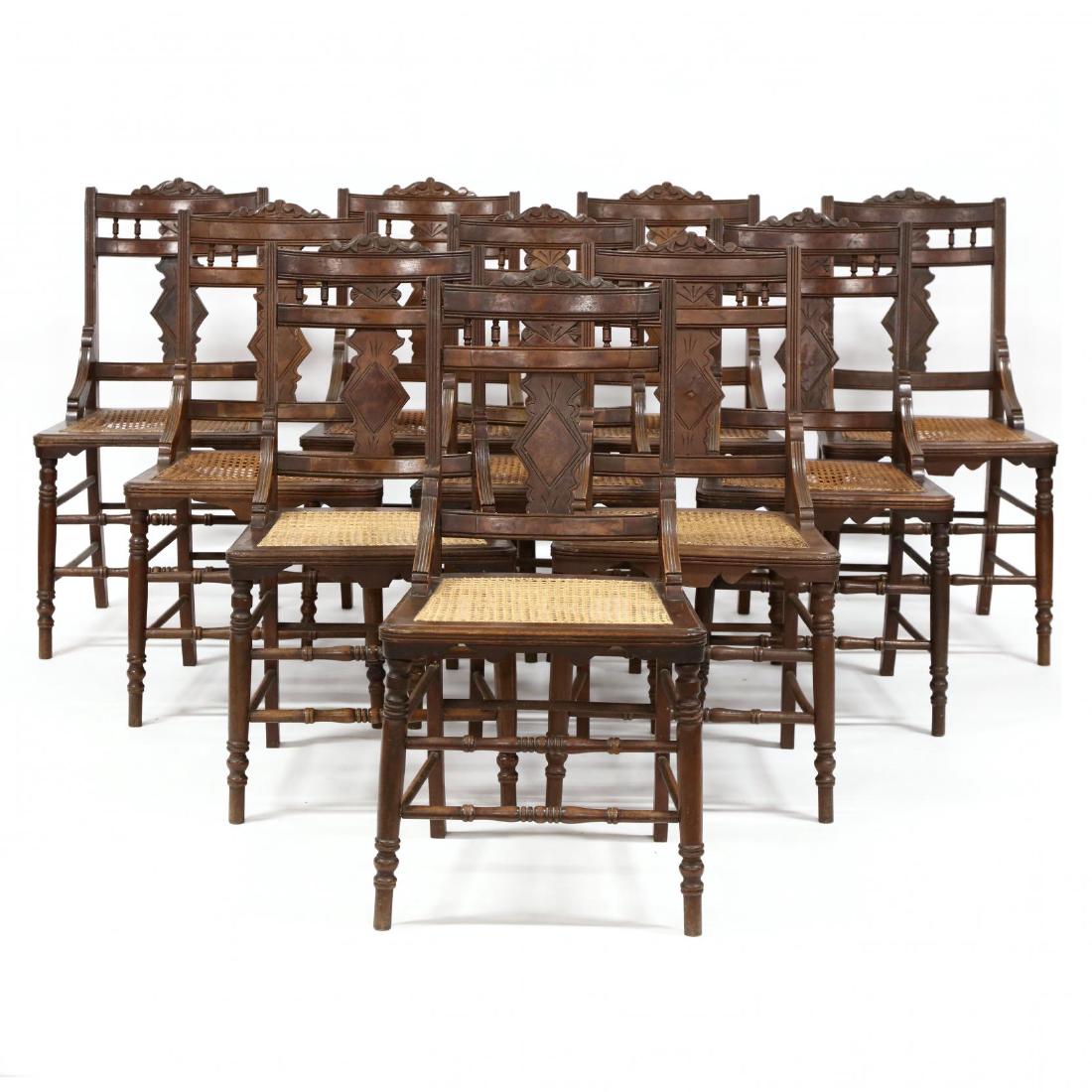 Set of Ten Eastlake Walnut Dining Chairs: late 19th century, crest rail with burled walnut veneers, caned seats, turned legs and stretchers. 35 x 18.5 x 17.5 in. Rare to find a set of ten in old surface. From the Thompson-Urquhart home in Lew