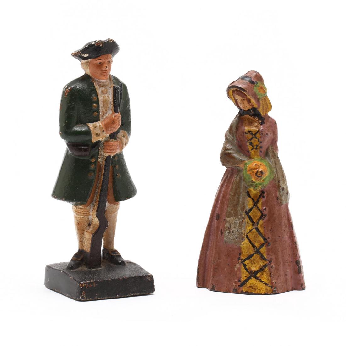 Two Cast Iron Colonial Figure Doorstops: early to mid 20th century, solid cast iron with hand painted decoration. Taller 7.5 in. The Collection of Mr. Wayne Lockey of Grand Junction, Colorado. Additional high-resolution photos are available